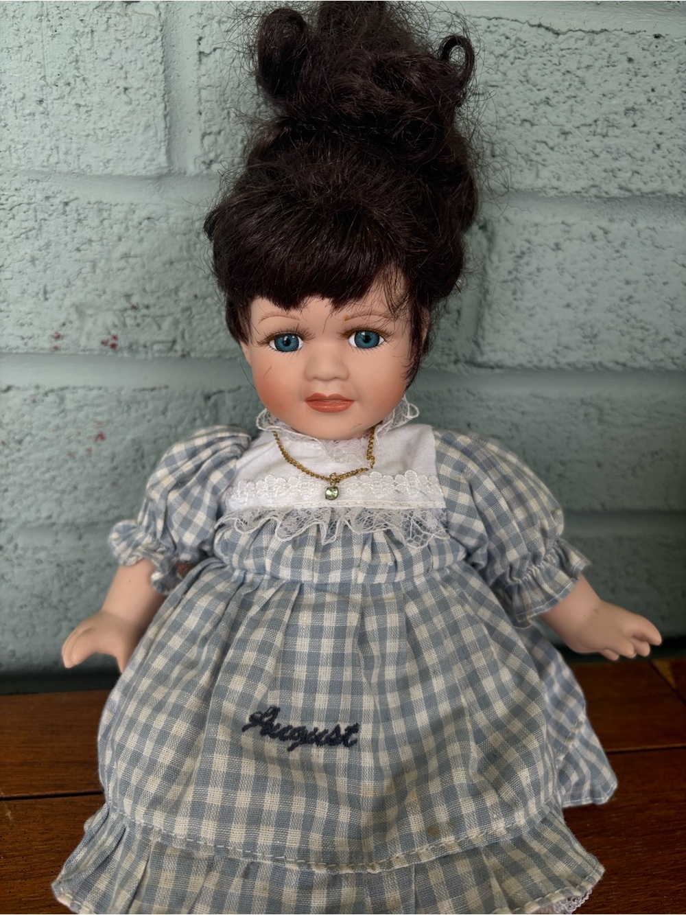 Porcelain Doll - August Embroidered on Dress & August Birthstone Necklace